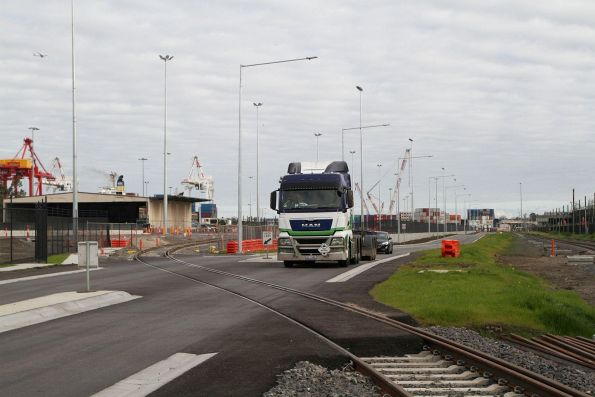 Looking west over the new level crossing between Intermodal Way and the Coode Road rail terminal siding