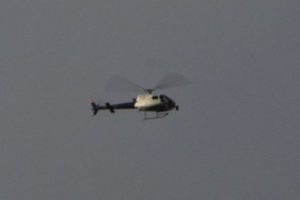 Channel 9 News helicopter filming the Sunshine station rail replacement bus interchange from the air