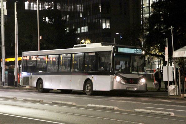 Melbourne Premier Buslines bus BS06UG on a rail replacement service on William Street at Flagstaff Gardens