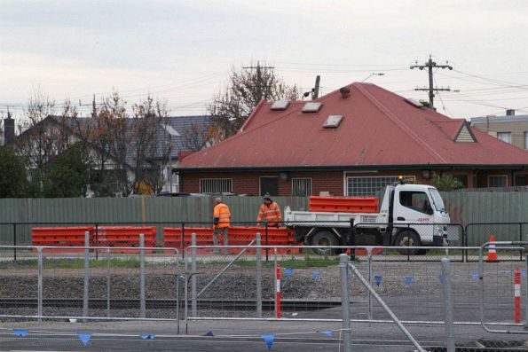 John Holland crew placing crash barriers along damaged sections of the Sunshine-Tottenham shared path