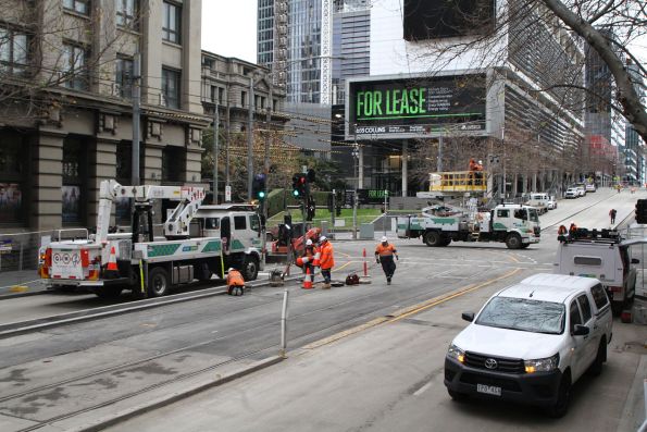 Scissor lift truck working on the tramway overhead at Spencer and Collins Street