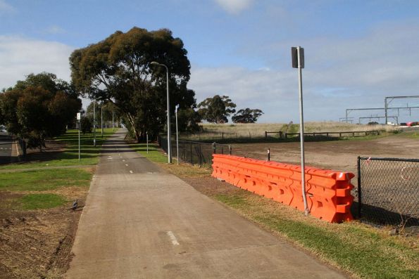 Crash barriers beside the Sunshine-Tottenham shared path replace a fence destroyed by Melbourne Airport Rail works