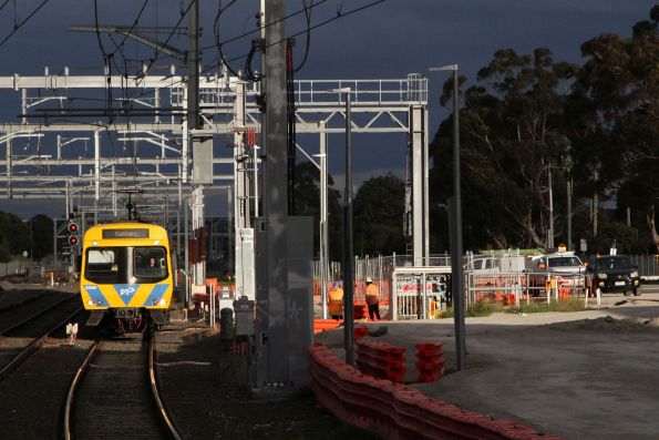 EDI Comeng 535M stops outside Albion to receive a caution order to proceed past the failed signal