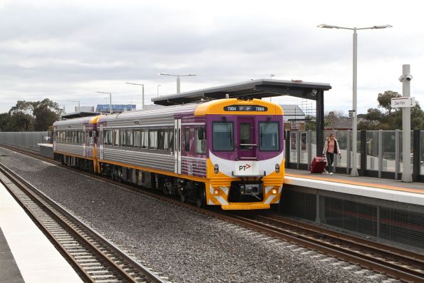 Freshly refurbished Sprinter 7004 leads 7002 through Deer Park on an up test run from Geelong