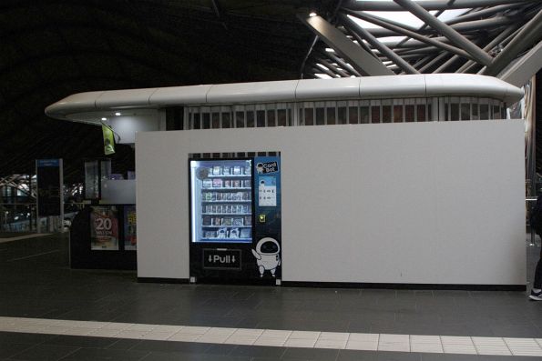 'Card Bot' trading card vending machine installed in front of the abandoned Spanish Doughnuts shop at Southern Cross Station