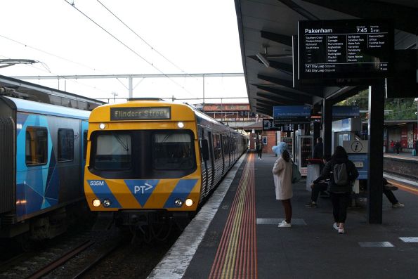 EDI Comeng 535M arrives into North Melbourne platform 3 with a 'Pakenham' service