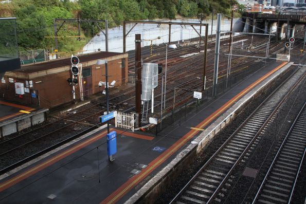 'HCMT car stop' sign at North Melbourne platform 3, with 'Metro trains stop here' sign on platform 5 which was extended for 7-car VLocity trains 15 years ago