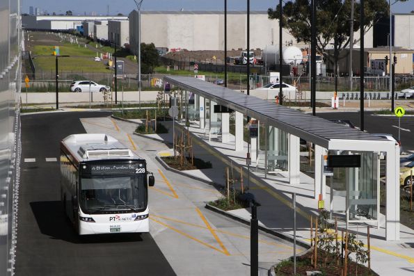 PTV liveried Kinetic bus #228 BS06OR departs Deer Park station with the shuttle to Caroline Springs