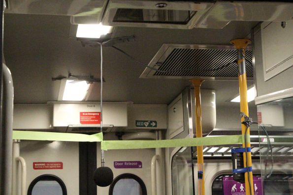 Noise measurement equipment set up inside the vestibule of modified Sprinter 7014 at Deer Park