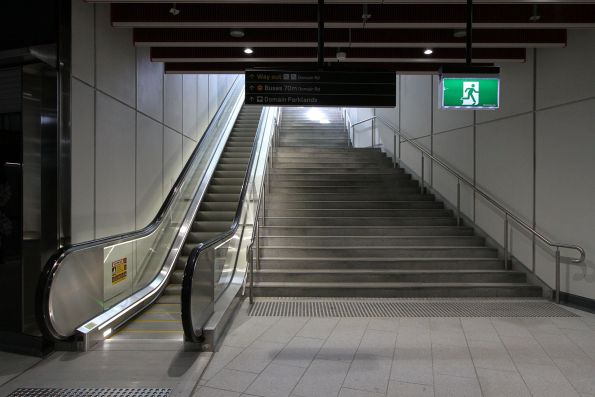 Single escalator and steps at the Domain Road entrance to Anzac station