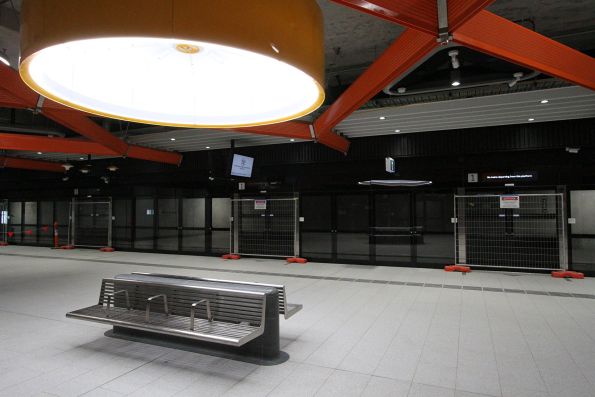 Pendant light fittings at platform level at Anzac station