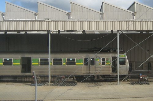 Hitachi 23M being worked on beside the Williamstown line